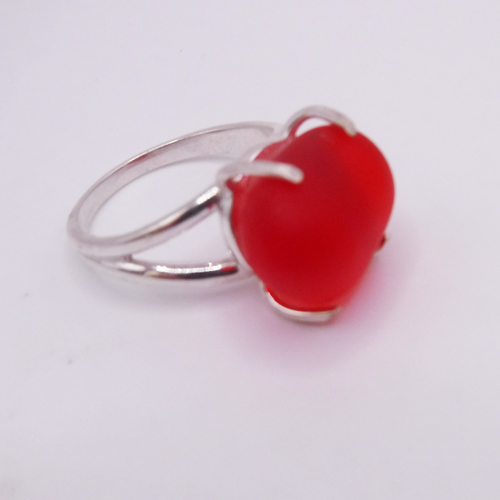 Chunky piece of red sea glass set in a prong setting